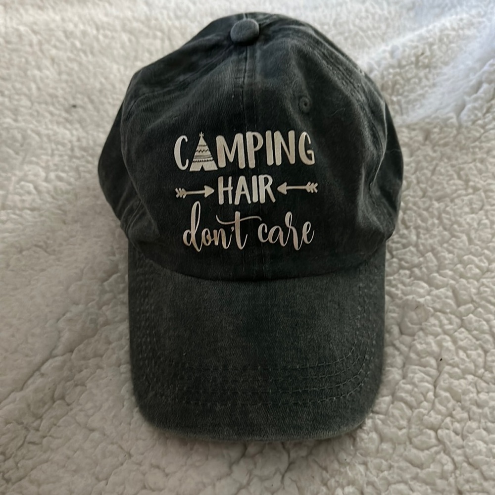 NWOT women’s ball cap distressed gray with “Camping Hair Don’t Care”, adjustable